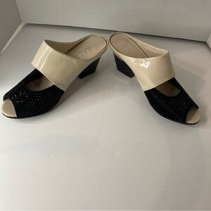 Chic Black and Cream Mules with Glossy Finish